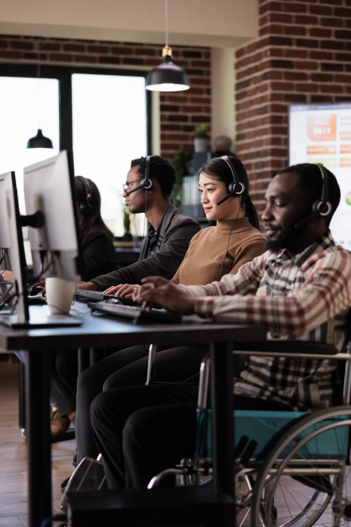 paralyzed-wheelchair-user-working-at-call-center
